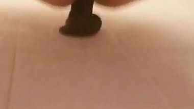 My fucktoy using a dildo in her ass.